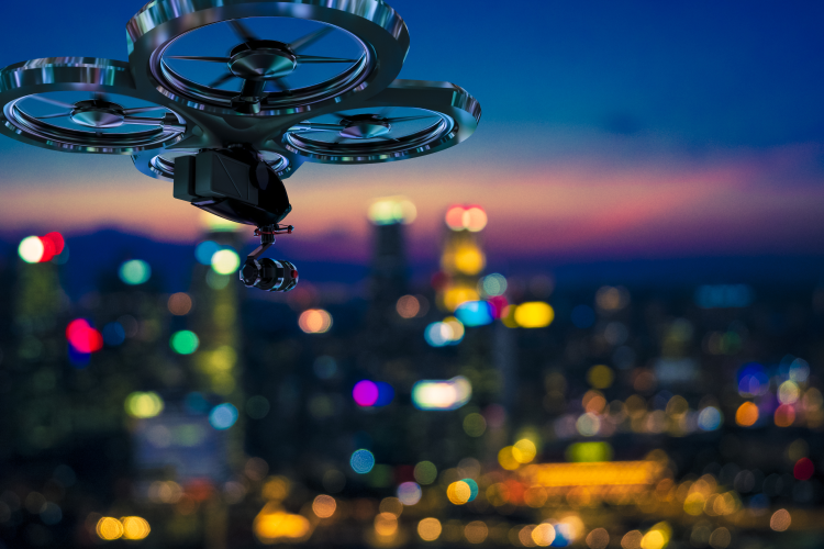 Drone flying in the sky at dusk